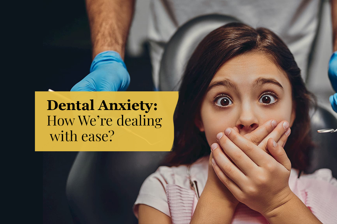 Nervous young patient covering her mouth in the dental chair