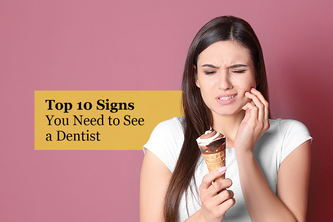 Woman wincing with tooth sensitivity while eating ice cream
