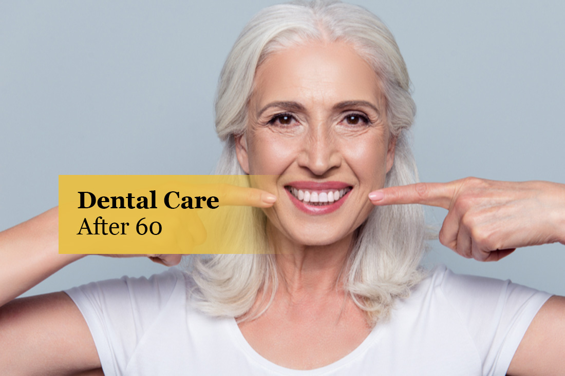 Dental Care After 60: smiling senior woman pointing at her healthy teeth
